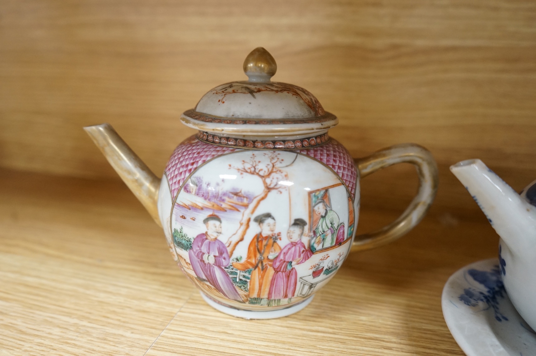 A group of 18th century Chinese export porcelain tea and coffee ware, including Mandarin pattern teapot and cover, two coffee cups and saucers, a blue and white teapot and cover various famille rose coffee cups, etc.